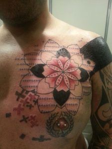 Tatuaje mandala por SEI, DNA Ink